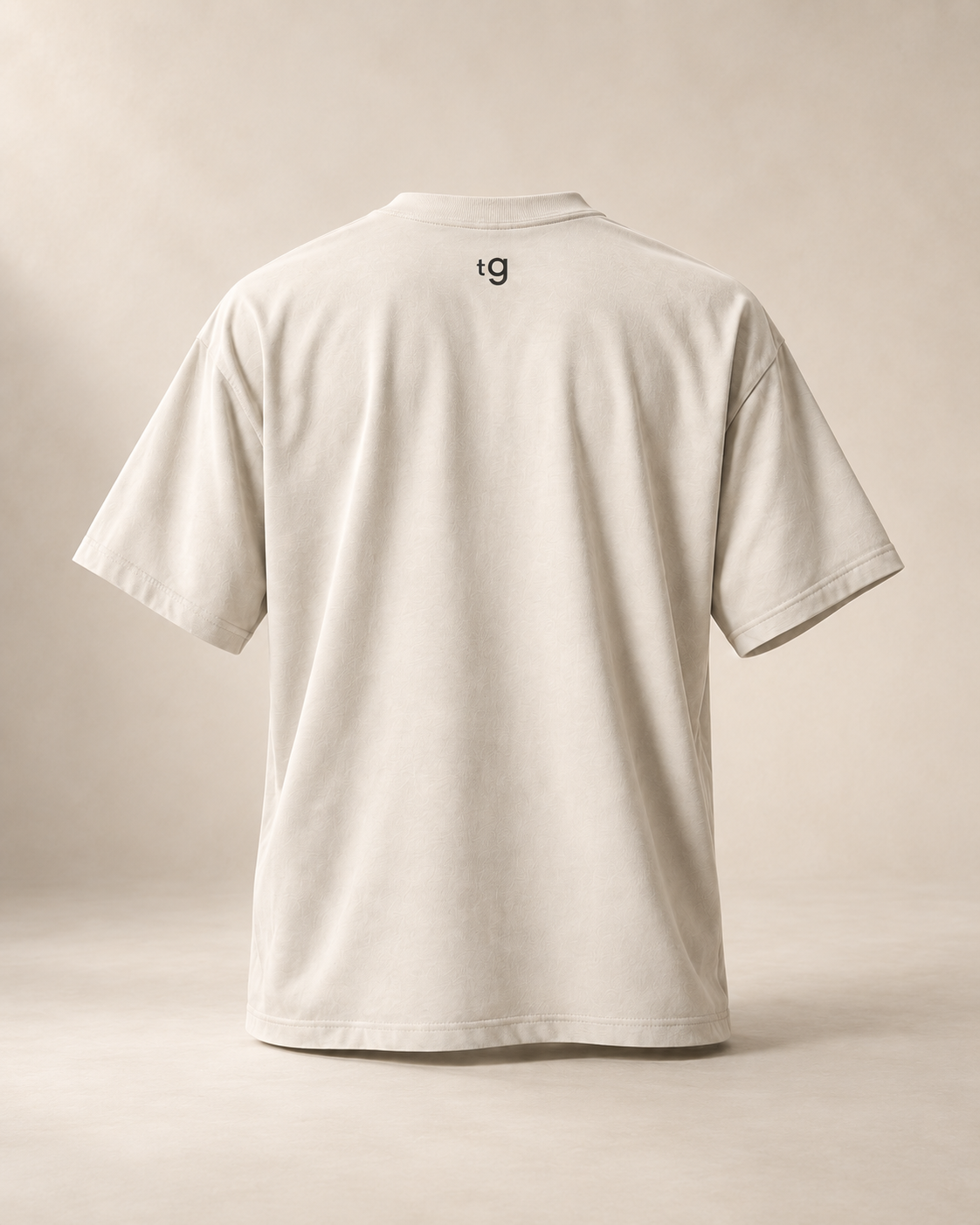 T-shirt sui TG, écru — vue dos, mockup réaliste